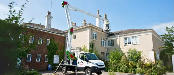 using our cherry picker on a commercial gutter cleaning job in Whitehawk, Brighton