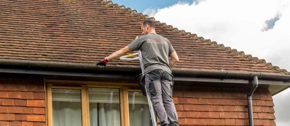 Gutter cleaning a residential property in Brighton and Hove