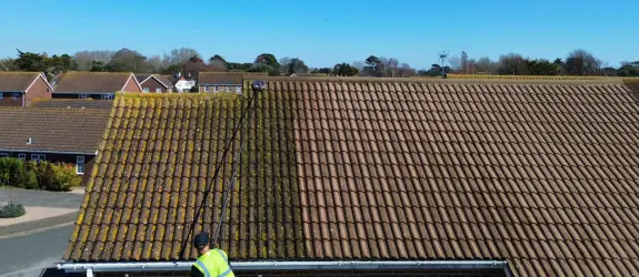 Roof cleaning a healthcare centre in Brighton and Hove